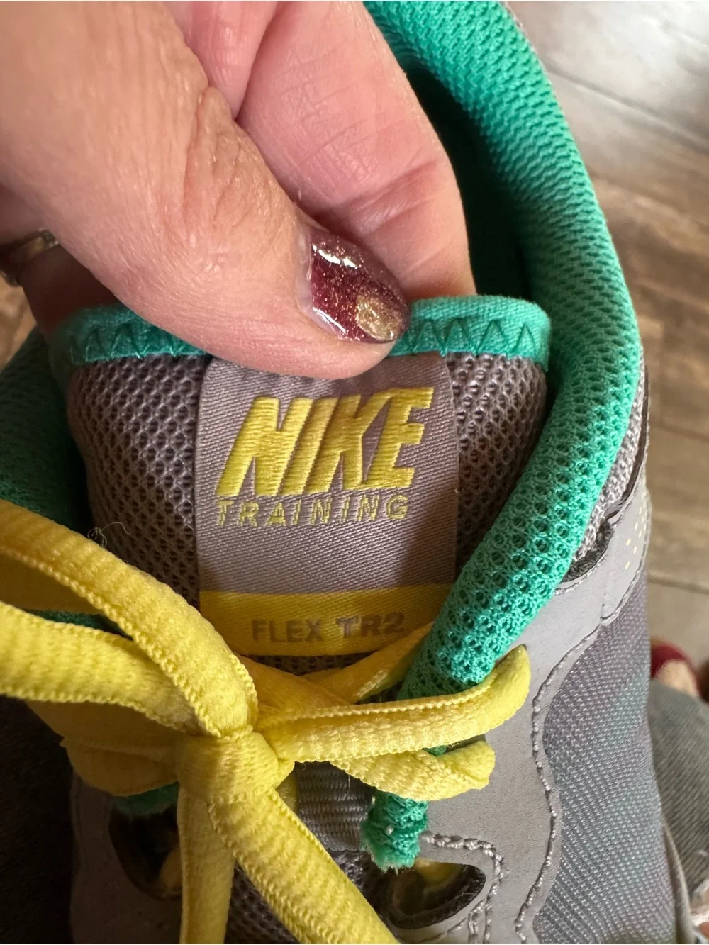 Nike Flex Trainer 2 athletic shoes with yellow & teal accents women’s size 8.5